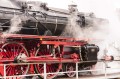 361128